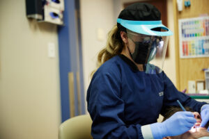 Our Hilliard dentists using Invisalign clear braces to straighten teeth.