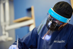 Hilliard OH dentist performing a bone graft during oral surgery.