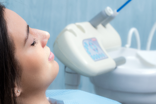 relaxed patient in a dental chair, routine checkup