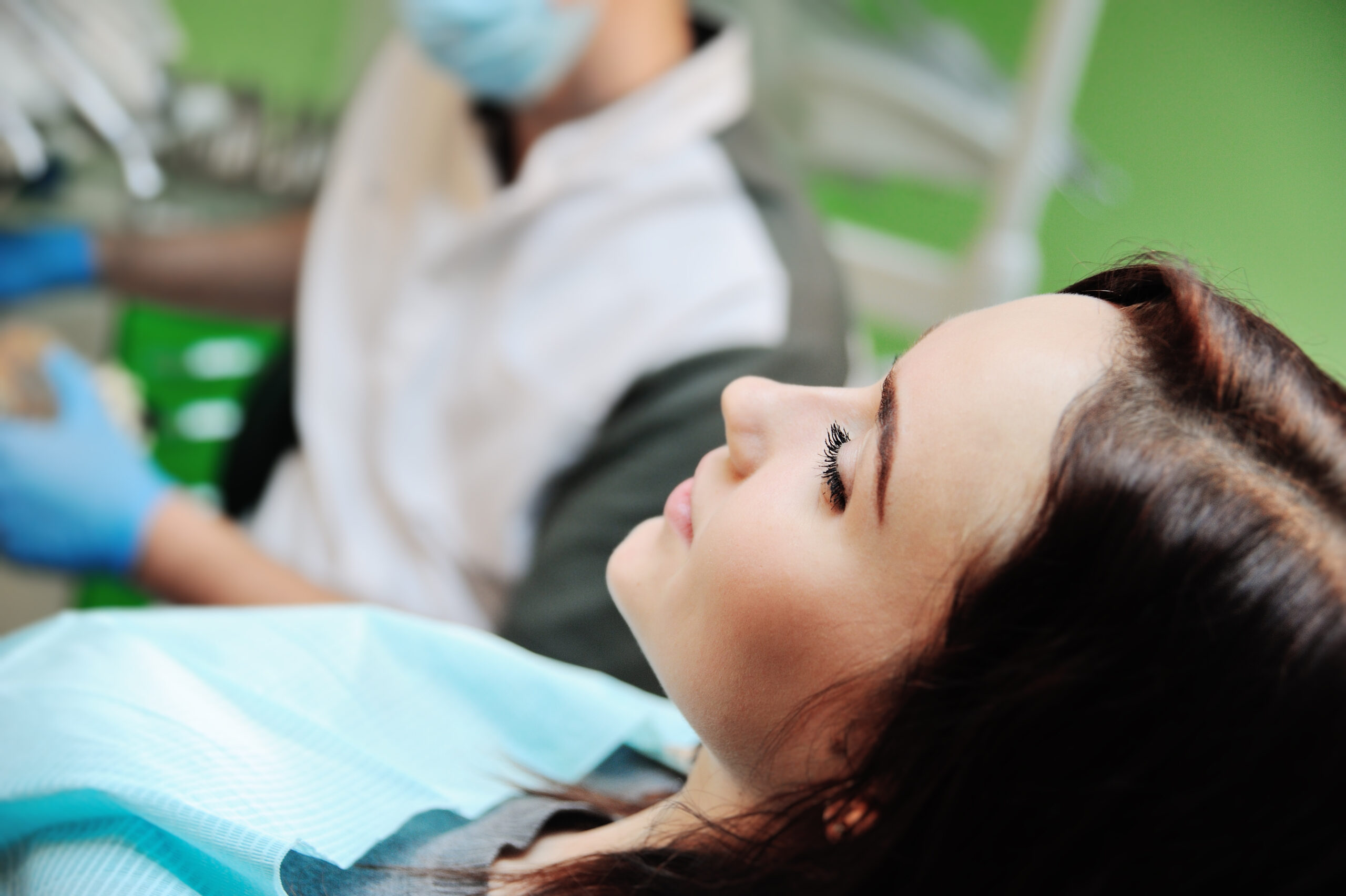 calm young woman sitting in a modern dental office
