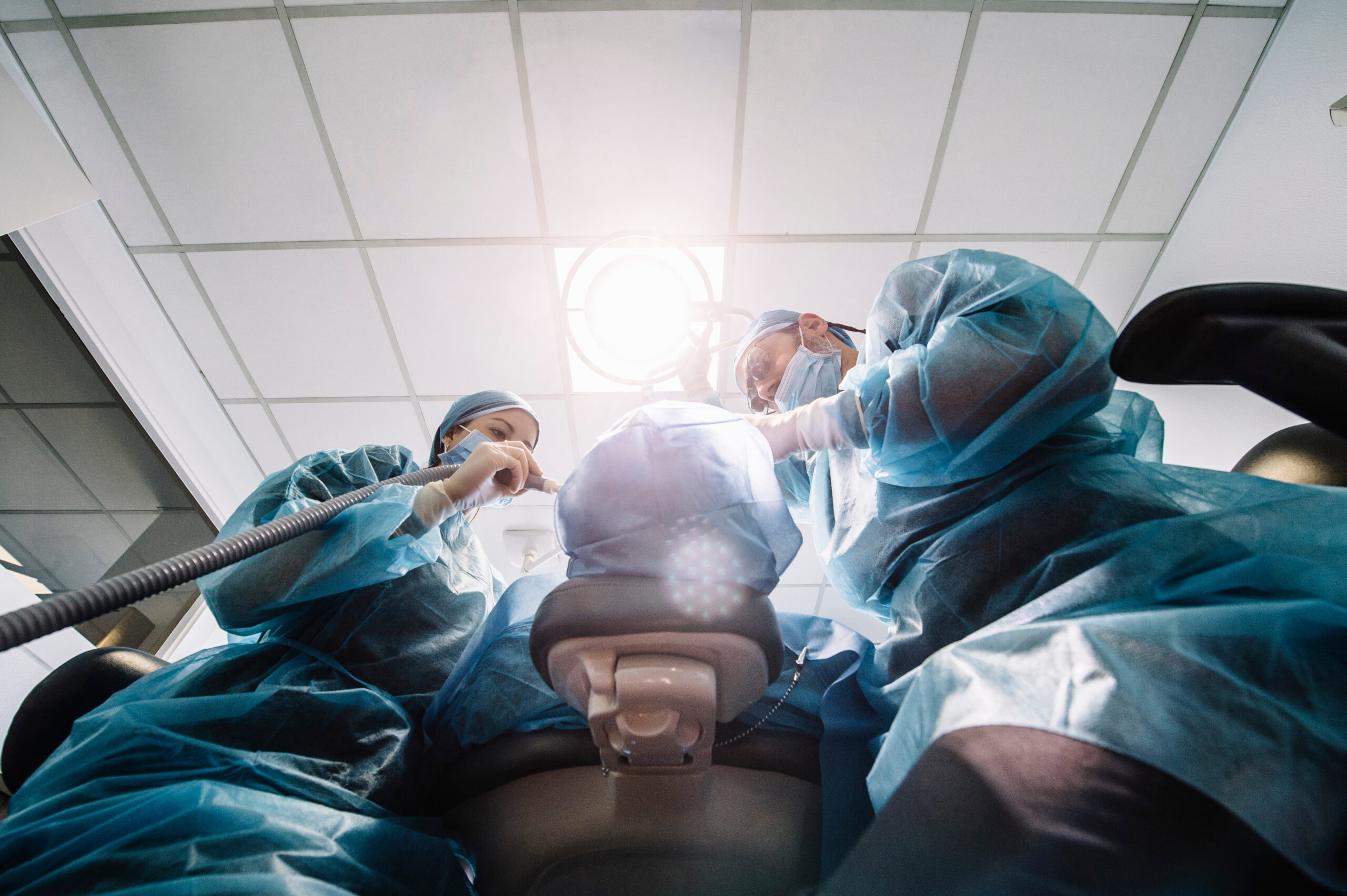 dentists performing oral surgery